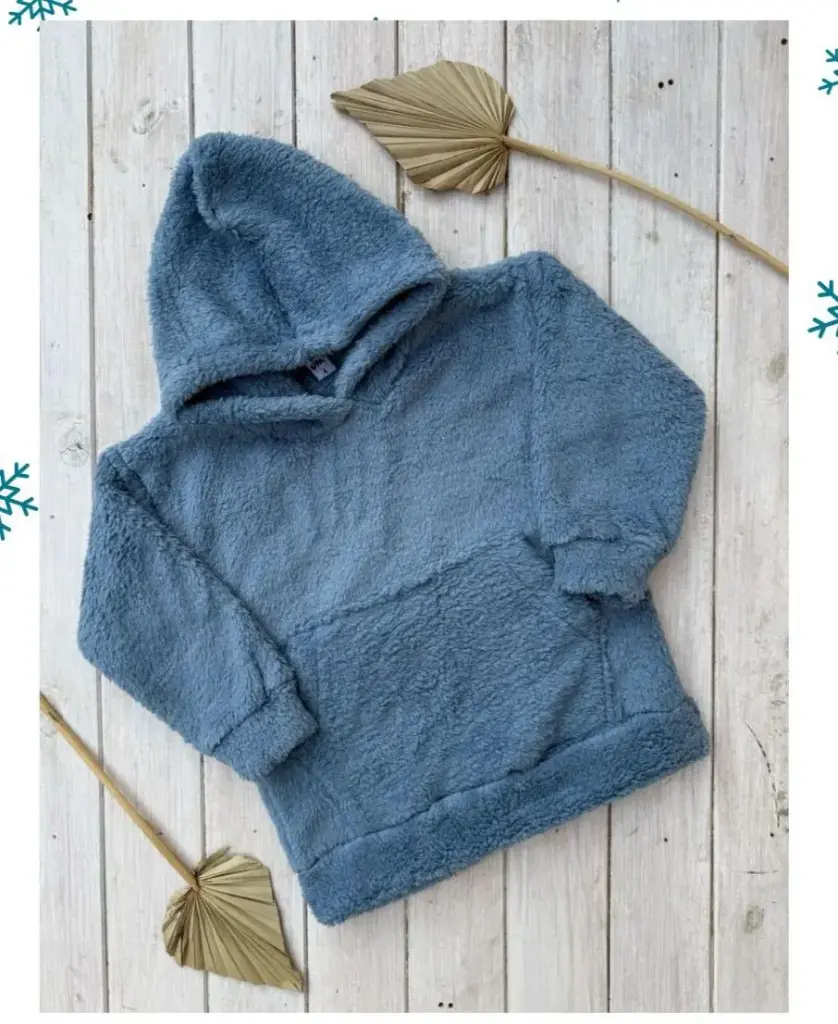 Buzo peluche oversize niño UPA